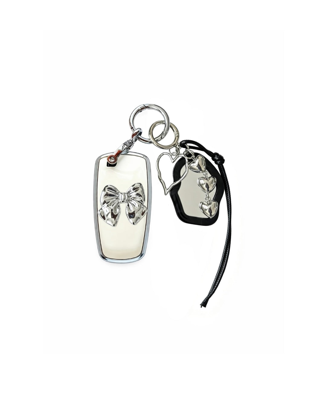 White Ford key fob case with black mirror and silver bow keychain