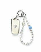 White Bmw key fob cover case with a pearl heart on the back, paired with a pearl white beaded wrist strap key chain featuring a blue accent bead and star charm, displayed on a white background.